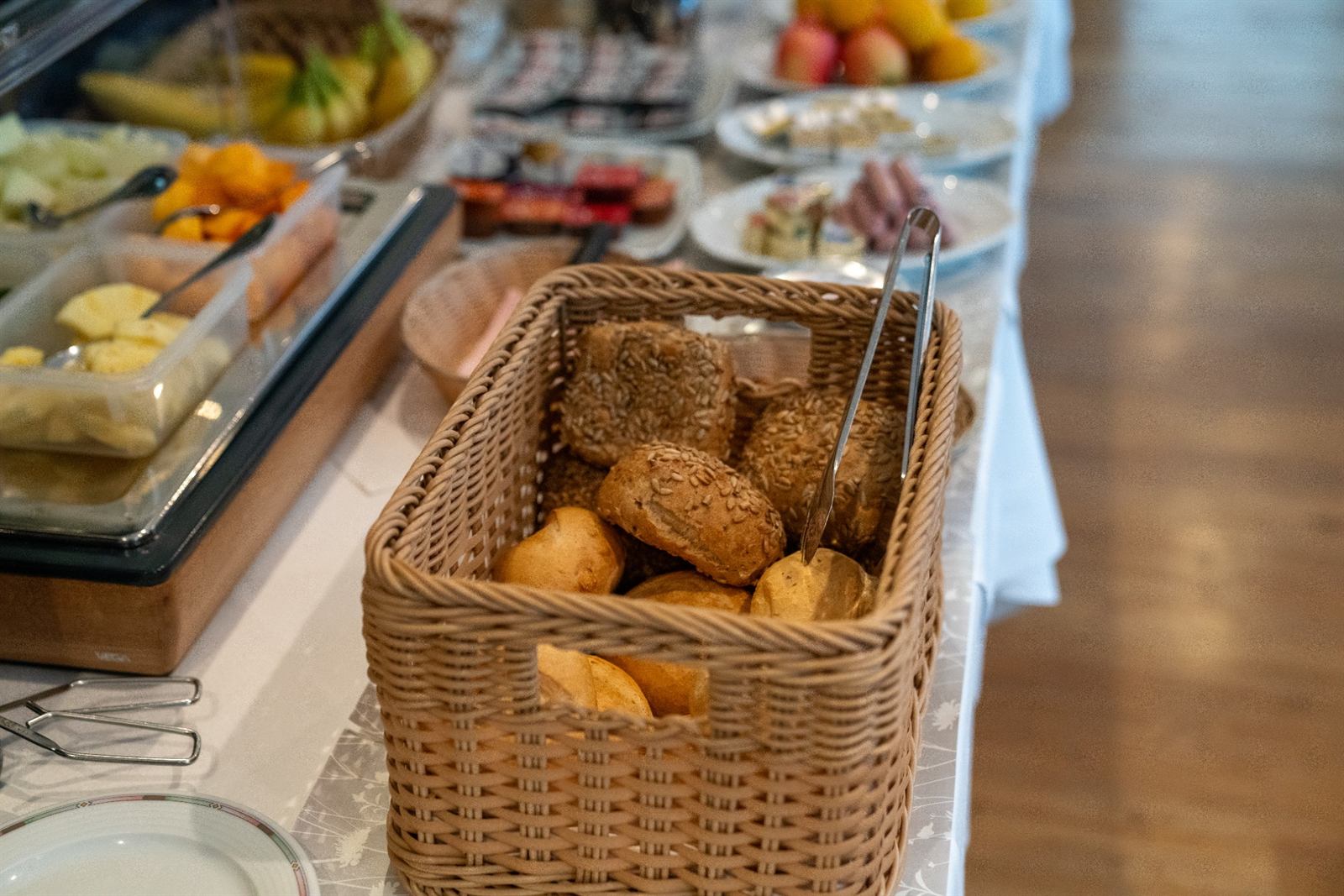 Basket of fresh rolls at the buffet