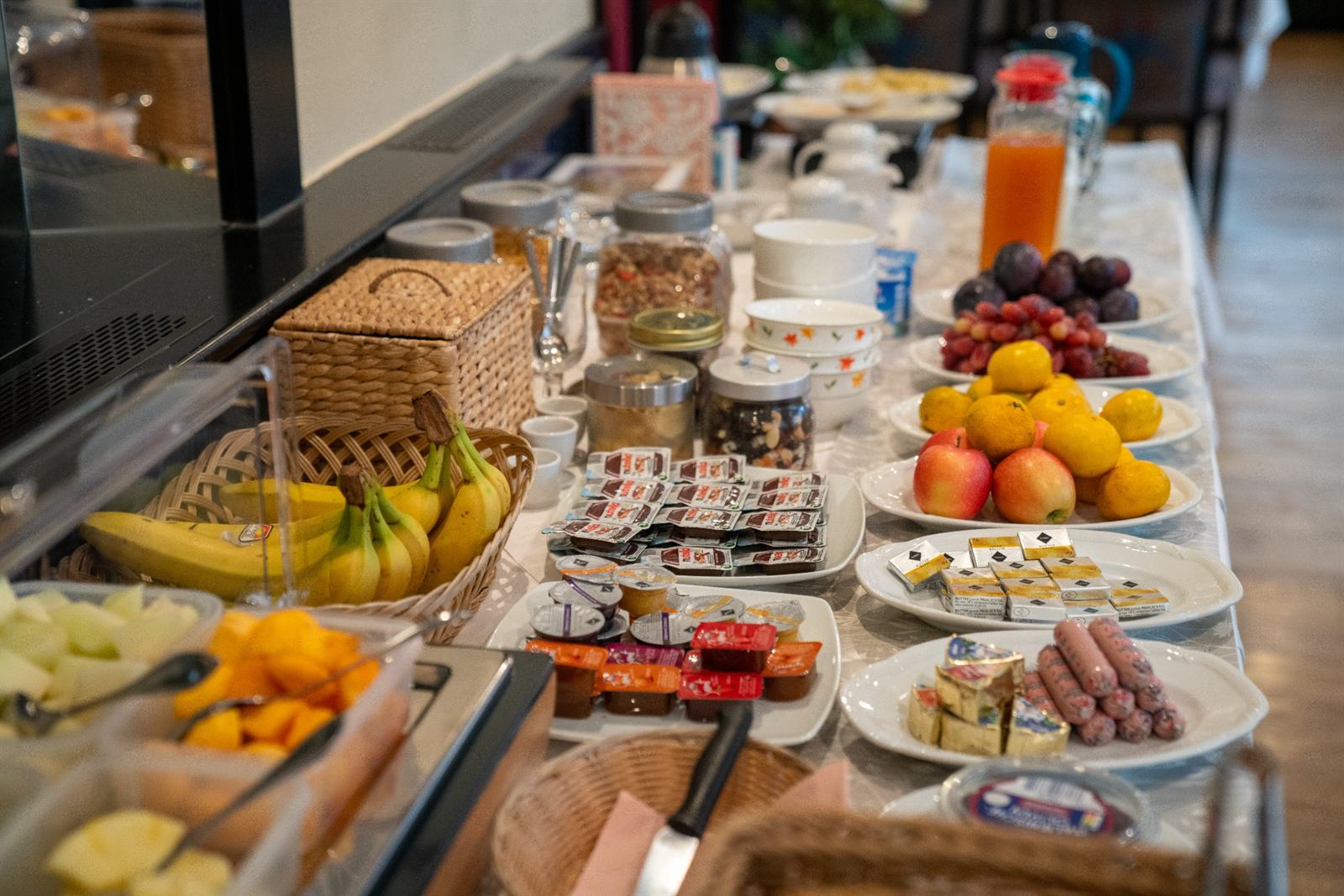 Buffet with fruit, muesli and spreads